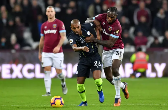 Fernandinho and Michail Antonio