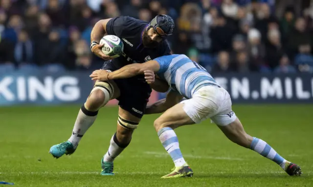 Josh Strauss carries for Scotland