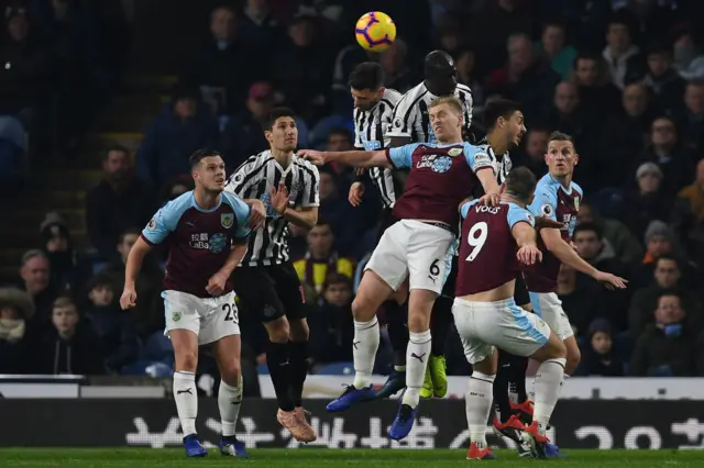 Ben Mee attempts to head the ball