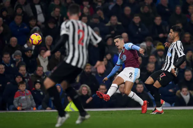 Matt Lowton crosses the ball