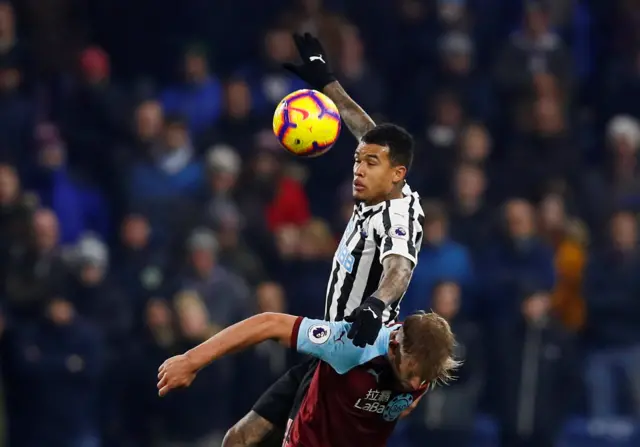 Kenedy heads the ball