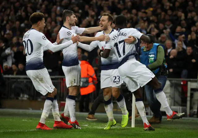 Christian Eriksen celebrates
