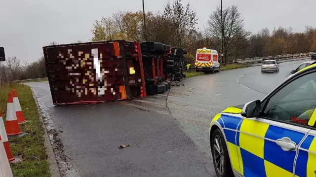 A lorry on its side