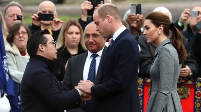 Prince William and Kate with Khun Top.