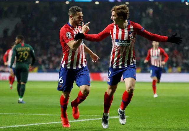 Koke celebrates scoring