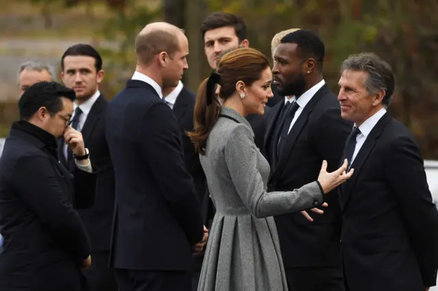 The Duchess of Cambridge talking to Claude Puel