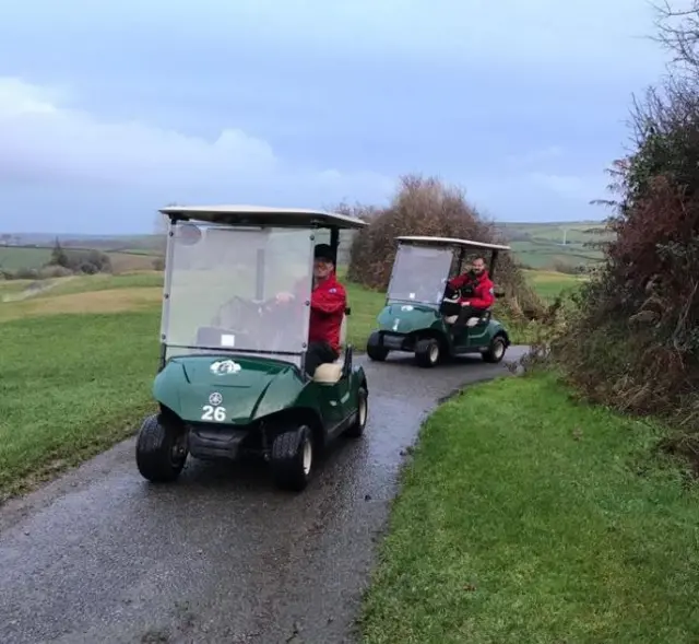 Search and rescue team in golf buggies