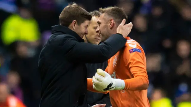 Steven Gerrard congratulates Allan McGergor