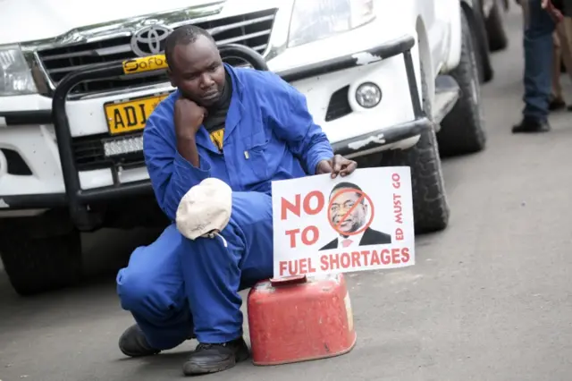 A protester with a fuel container, due to the continuing fuel crisis,as Movement For Democratic Change (MDC) Alliance party members gather in the Africa Unity Square, in Harare, Zimbabwe, 29 November 2018