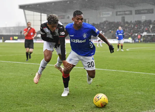 St Mirren's Ethan Erhahon (left) challenges Alfredo Morelos