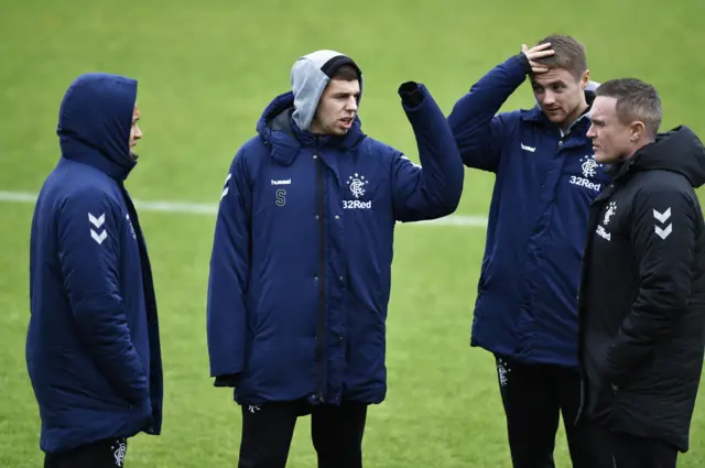 Rangers players on St Mirren's pitch
