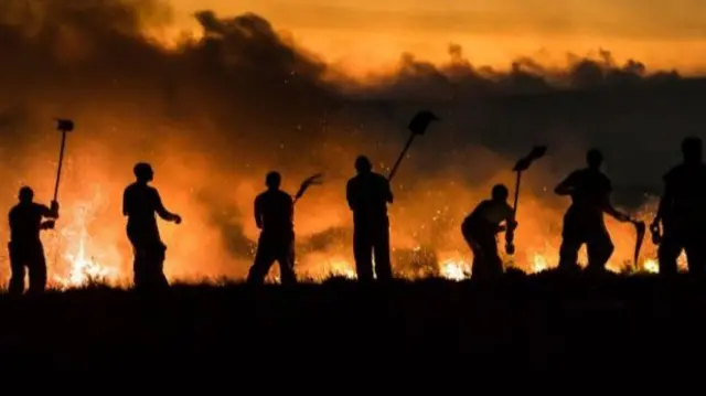 Firefighters battling blaze on moorland