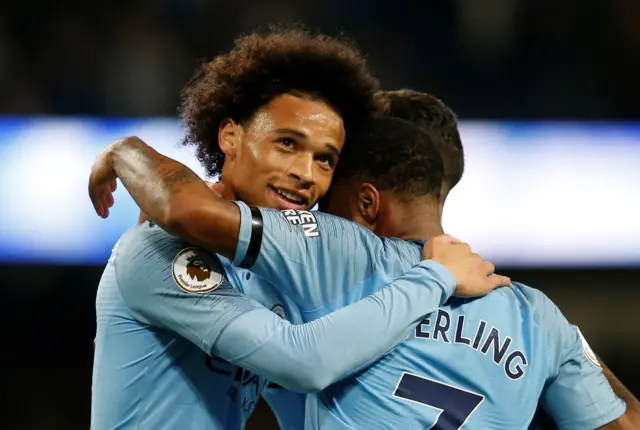 Leroy Sane and Raheem Sterling celebrate