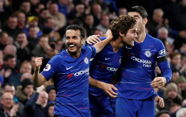 Pedro celebrates with his team mates