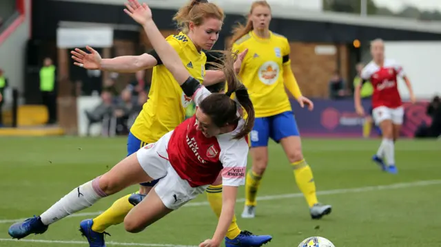 Birmingham's Aoife Mannion fouls Arsenal's Lisa Evans.