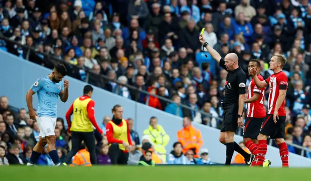 Sergio Aguero is booked