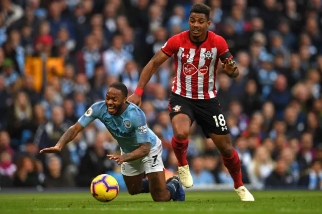 Raheem Sterling is brought down