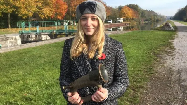 Grace Freeman from the Wilfred Owen Association with the bugle