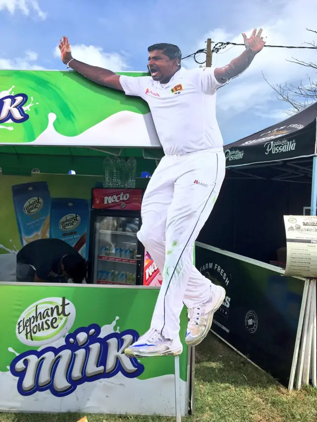 Cardboard cut-out of Rangana Herath