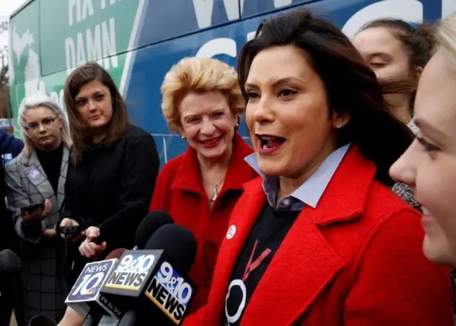 Gretchen Whitmer with U.S. Sen. Debbie Stabenow talk to reporters