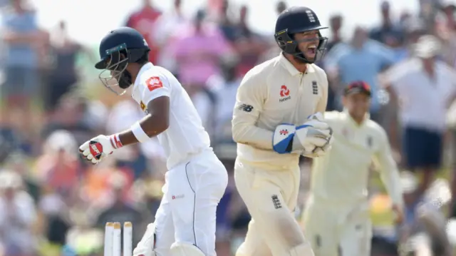 England wicketkeeper Ben Foakes celebrates after stumping Dinesh Chandimal