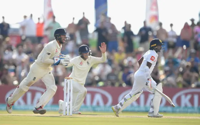 England wicket keeper Ben Foakes celebrates with captain Joe Root after Foakes had caught out Sri Lanka batsman Akila Dananjaya