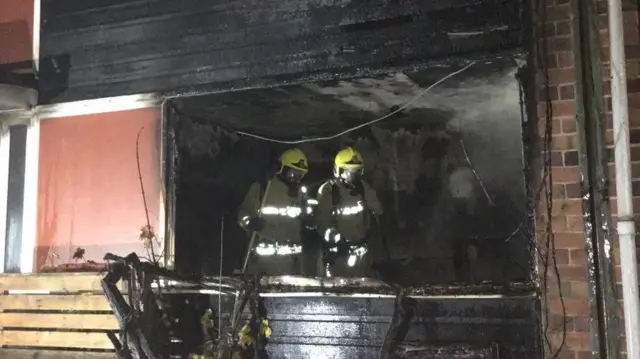 Firefighters inside the house