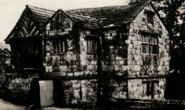 The gatehouse, pictured in 1912,