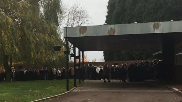 Some of the crowd outside the crematorium