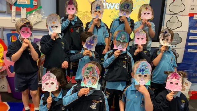 Kids wearing masks