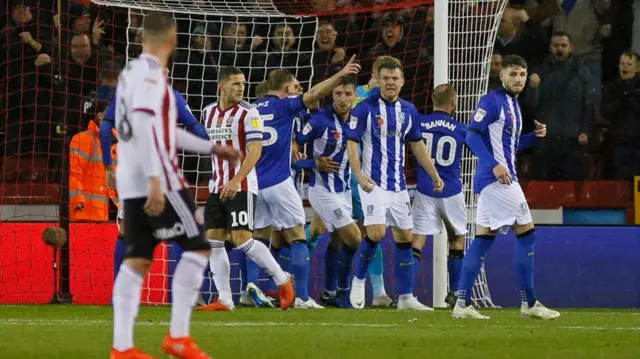 Owls celebrate penalty save