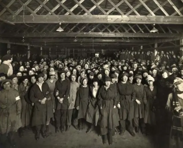 Women working at the Barnbow munitions factory in Leeds hear news of The Armistice.