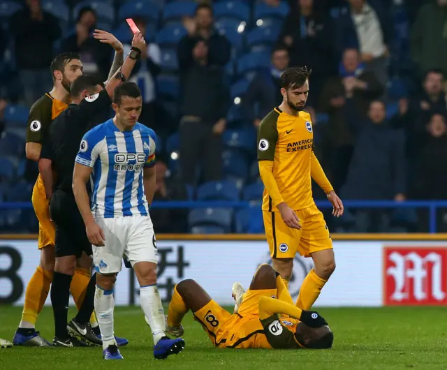 Steve Mounie is sent off