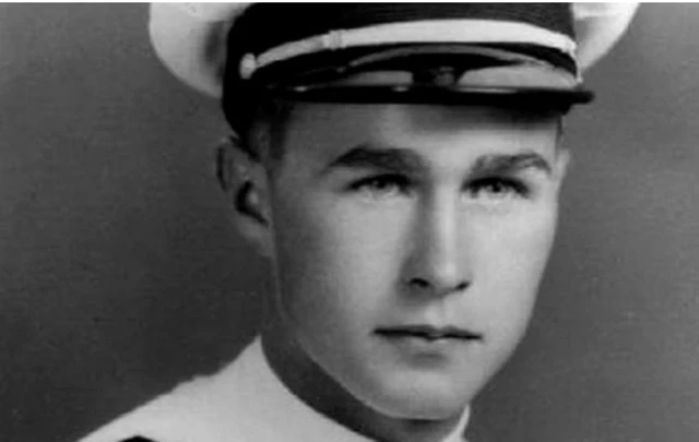 George HW Bush in naval uniform