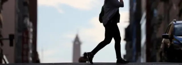 Woman walking on street