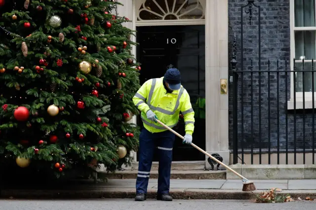 Sweeper outside No. 10 Downing Street