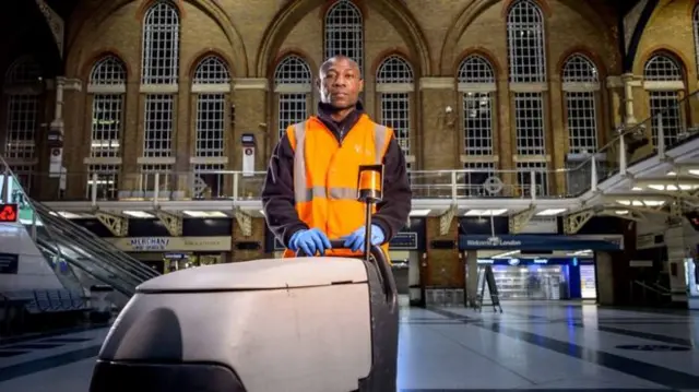 A cleaner at London Liverpool Street station