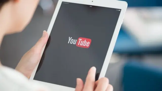 YouTube icon on a tablet computer