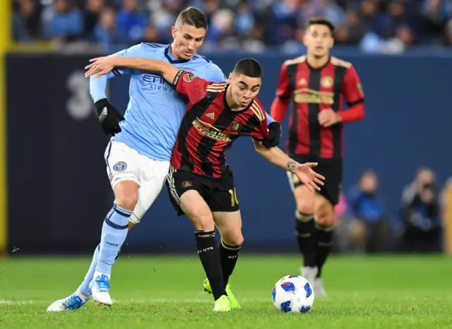 New York City FC defender Ben Sweat and Atlanta United midfielder Miguel Almiron