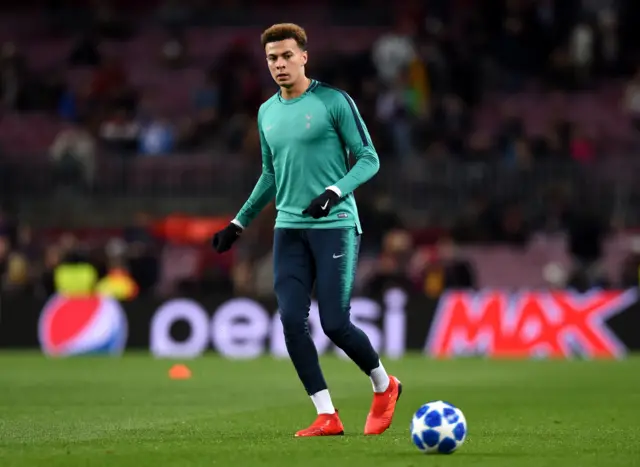 Dele Alli warms up