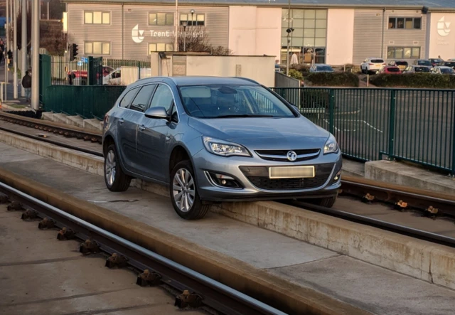 Car on tram track