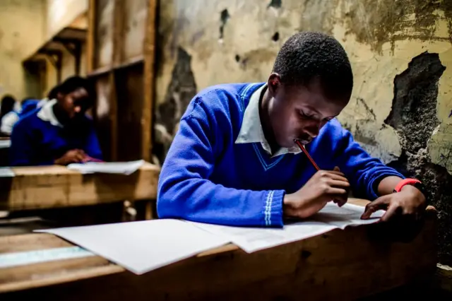 Pupils from Mercury Junior Academy School take the Kenya Certificate of Primary Education (KCPE) exam after a return to daily life following post-election turmoil on October 31, 2017 in the Mathare slums of Nairobi