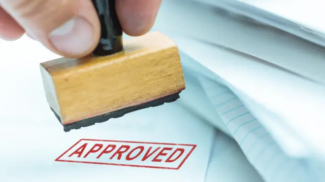 An approved ink stamp