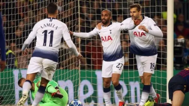 Lucas Moura (centre) scored