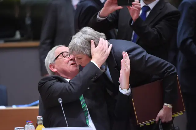 EU's Juncker greets Theresa May