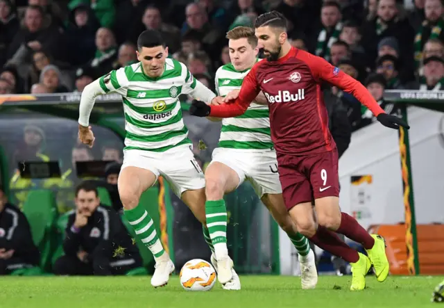 Tom Rogic and James Forrest chase after Moanes Dabour (right)