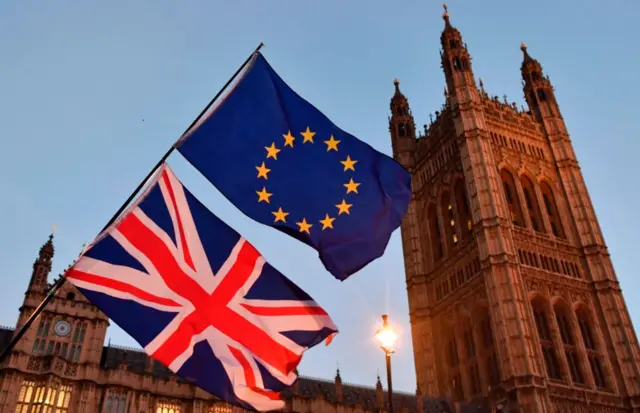 UK and EU flags in Westminster