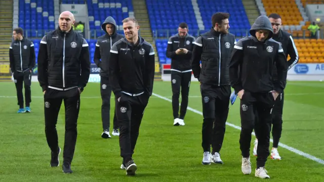 Motherwell players take a walk on the McDiarmid Park surface