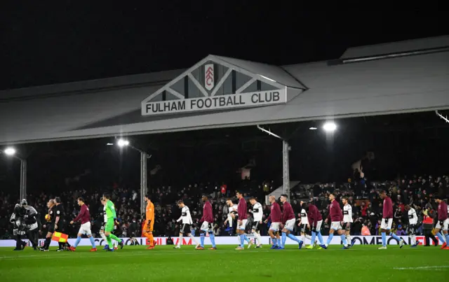 Players walk out