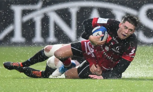 Lyon"s French centre Pierre-Louis Barassi is tackled